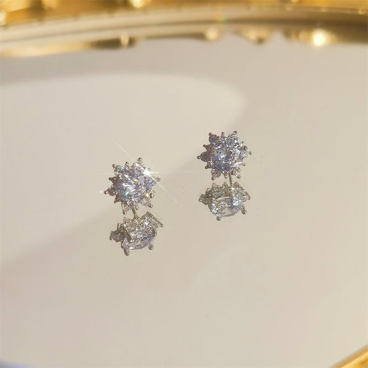 Six petal snowflake stud earrings